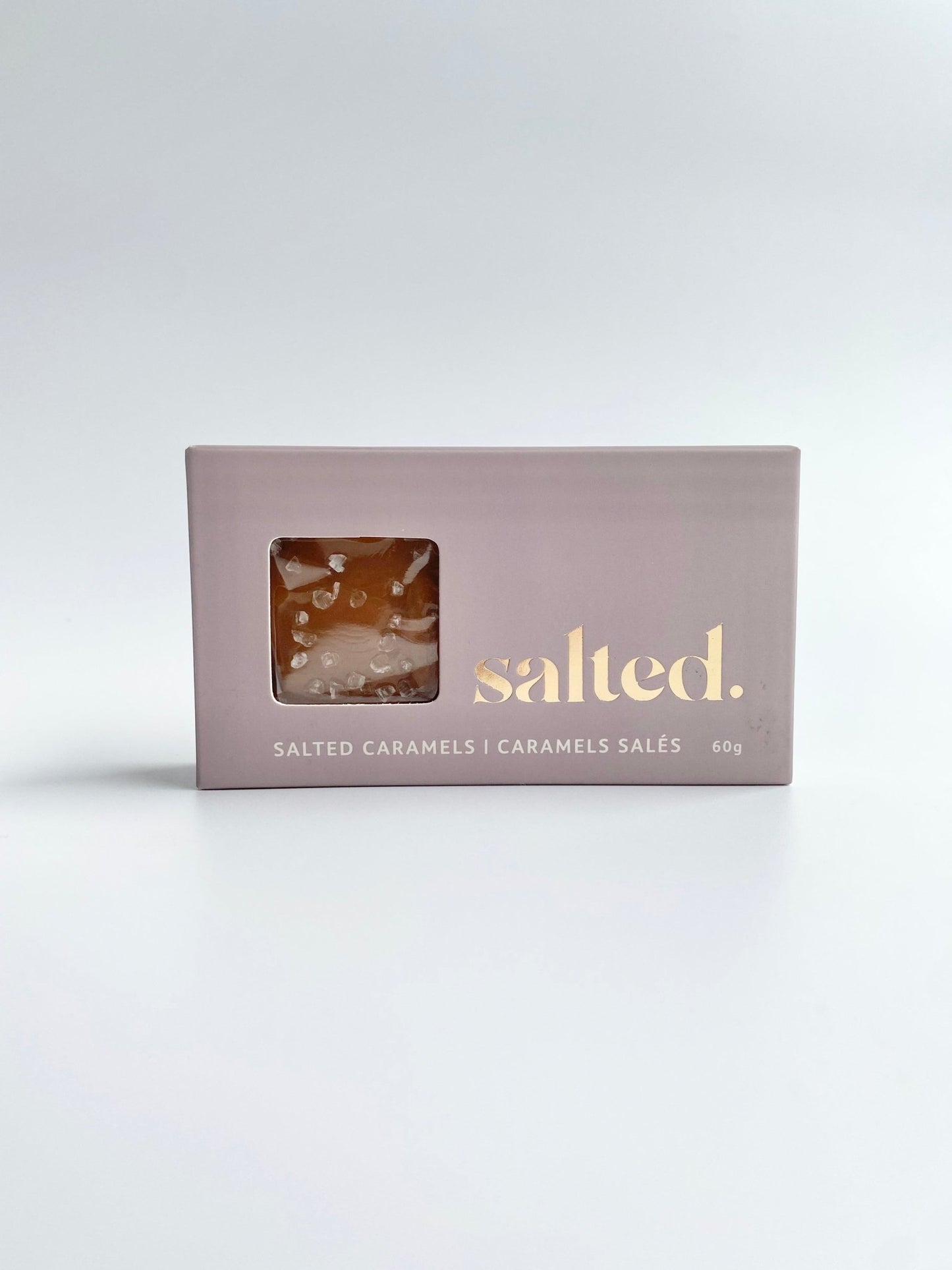 Two handmade sea salt caramels in elegant gift box from Shop Salted
